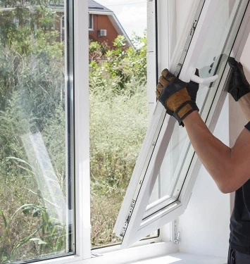 Window and screen repair service in a residential home