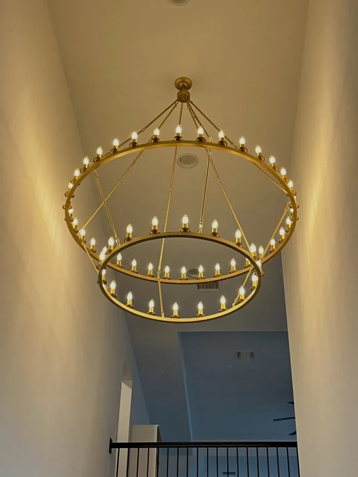 After chandelier installation in Green Bay – newly installed chandelier in a Green Bay dining room