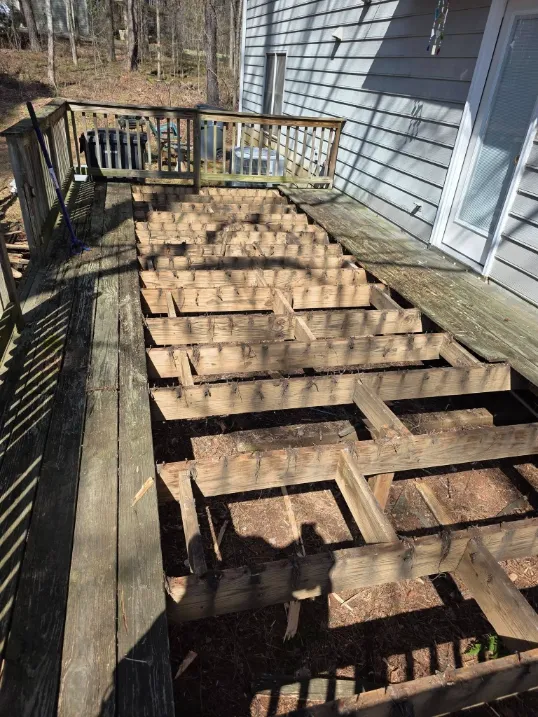 After deck board repair in Green Bay – solid, newly replaced wood deck boards