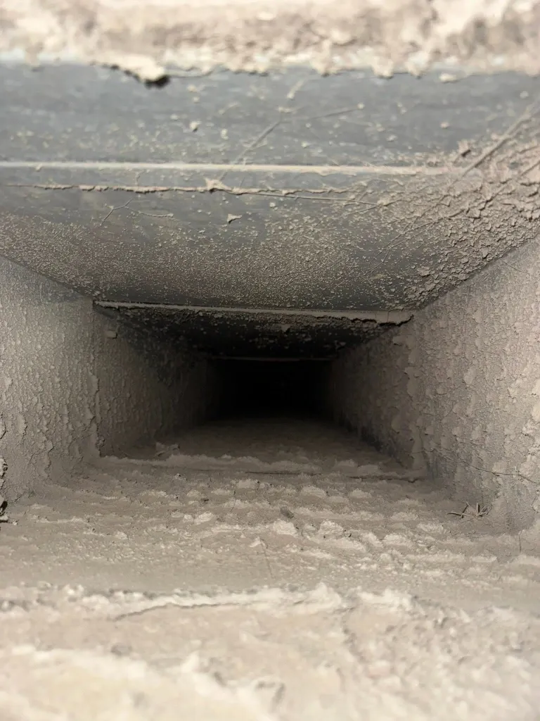Before dryer vent duct cleaning in Green Bay – blocked dryer exhaust duct restricting airflow