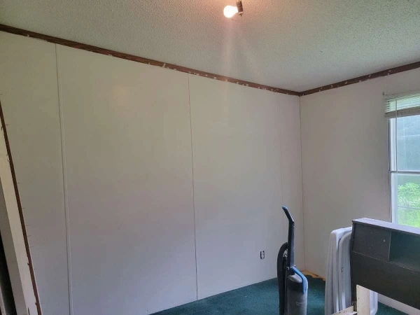 After drywall hole repair in Green Bay – smooth, flush wall patch