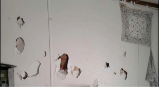 Before drywall hole repair in Green Bay – doorknob hole in interior wall