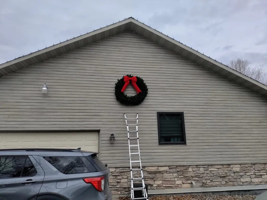 Before holiday porch light installation in Green Bay – dark front porch with no holiday lighting