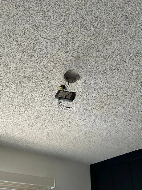 Before new ceiling fan installation in Green Bay – standard ceiling light fixture
