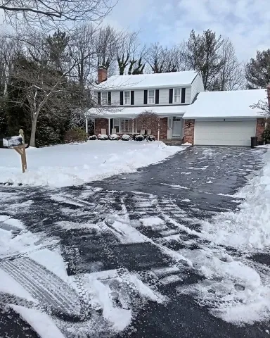 After sidewalk snow removal in Green Bay – cleared front sidewalk and steps safe for walking