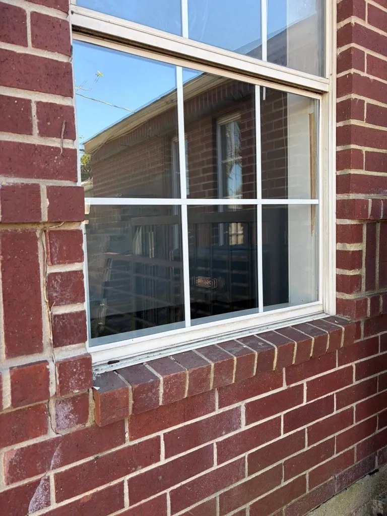 After window repair in Green Bay – double-hung window opens and closes smoothly