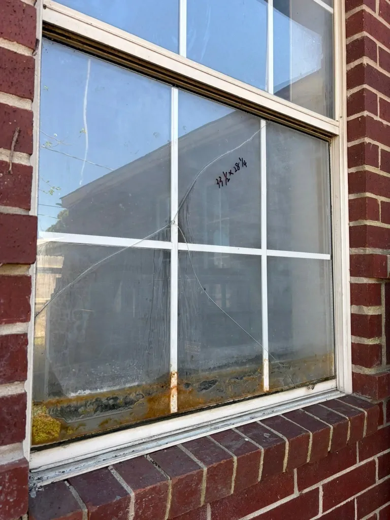 Before window repair in Green Bay – stuck double-hung window sash