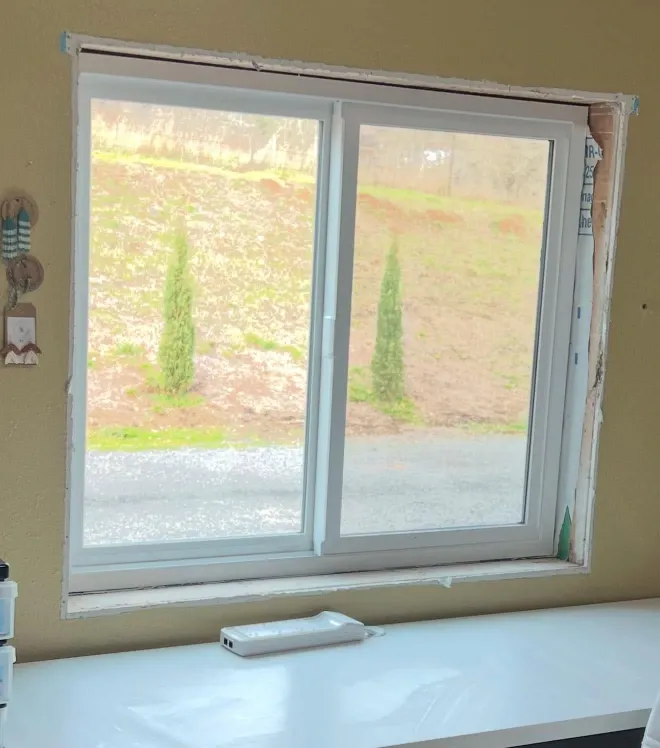 Before window repair in Green Bay – soft, rotting wooden window sill